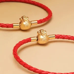 FúFlow™ - Pulseira Talismã de Prosperidade 福 | Couro Trançado e Banho Ouro 18K